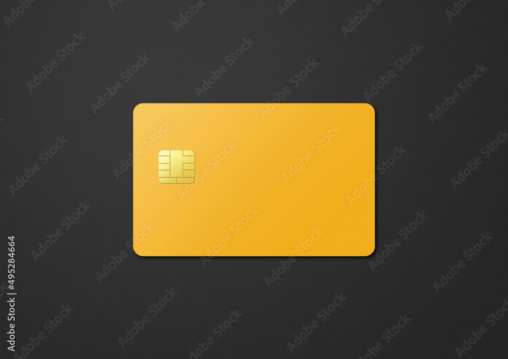 Yellow credit card on a black background Yellow credit card on a black background