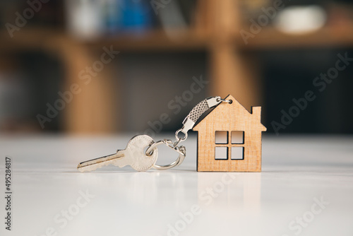 Keychain house with keys. photo