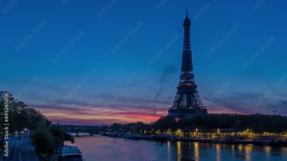 Colorful Sunrise Behind Eiffel Tower in Paris With Seine River