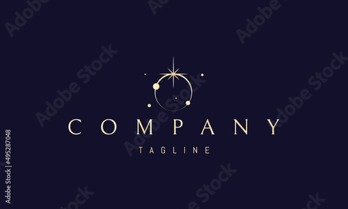 Vector golden logo on which an abstract image of a solar eclipse with a shining star on it.