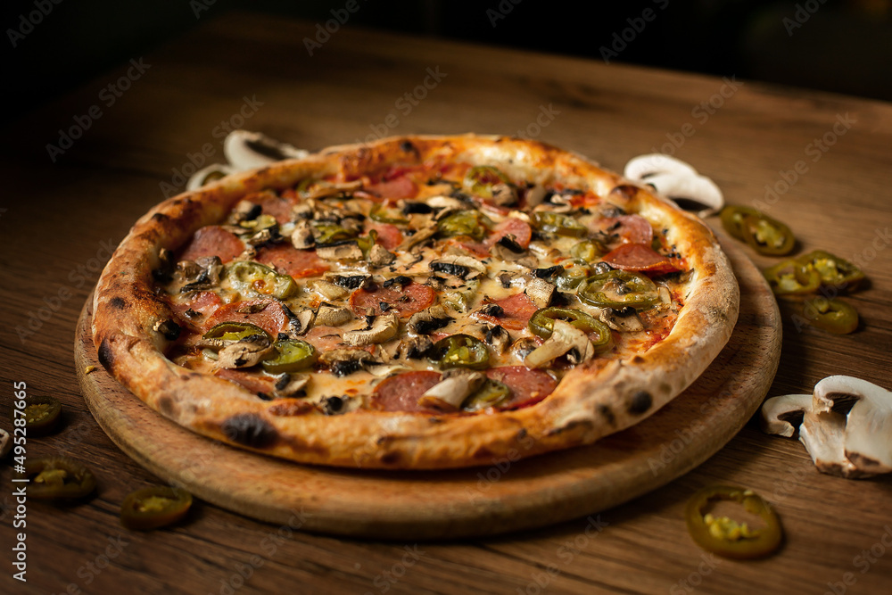 delicious italian pizza served on wooden table delicious italian pizza served on wooden table