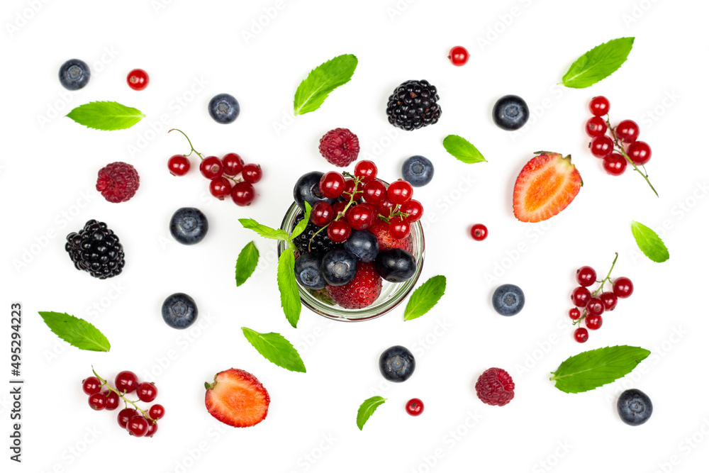 Ripe sweet berries and mint leaves on isolated white background. Flat lay, top view. Ripe sweet berries and mint leaves on isolated white background. Flat lay, top view.