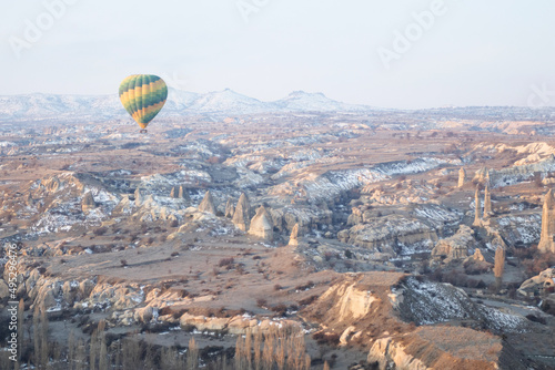 Hot Air Balloon flying at sunrise in Cappadocia, Turkey