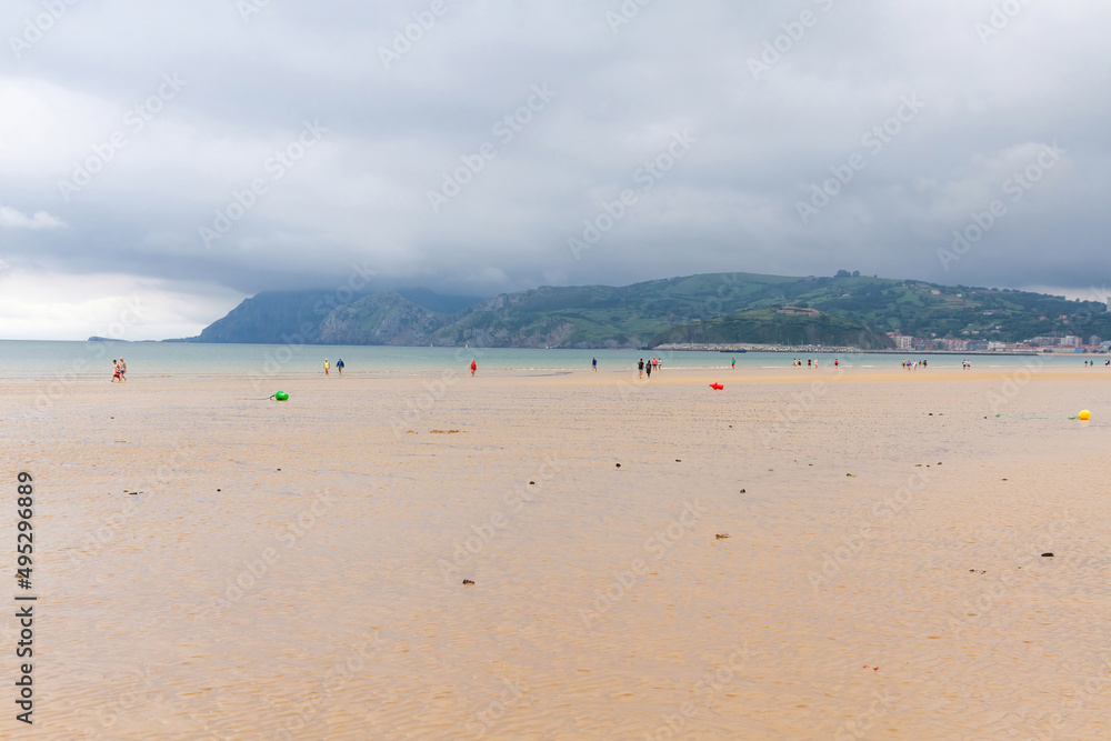 Laredo beach with people in summer. Cantabria, Spain Laredo beach with people in summer. Cantabria, Spain