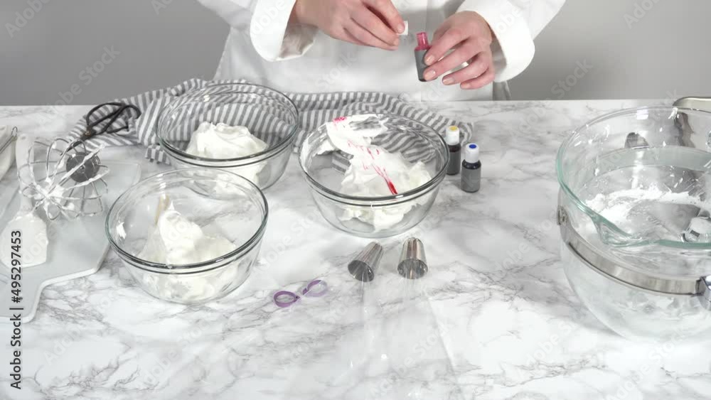 Time lapse. Step by step. Mixing food coloring into the meringue to bake unicorn meringue cookies. Time lapse. Step by step. Mixing food coloring into the meringue to bake unicorn meringue cookies.