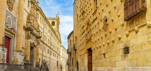 Famous architecture of Salamanca with medieval buildings, including the Casa de las Conchas in Spain. photo