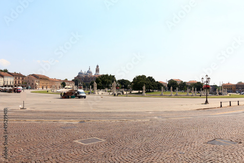 Large square Prato della Valle and Church monastery Abbey of Santa Giustina in the background in Padua, Italy photo
