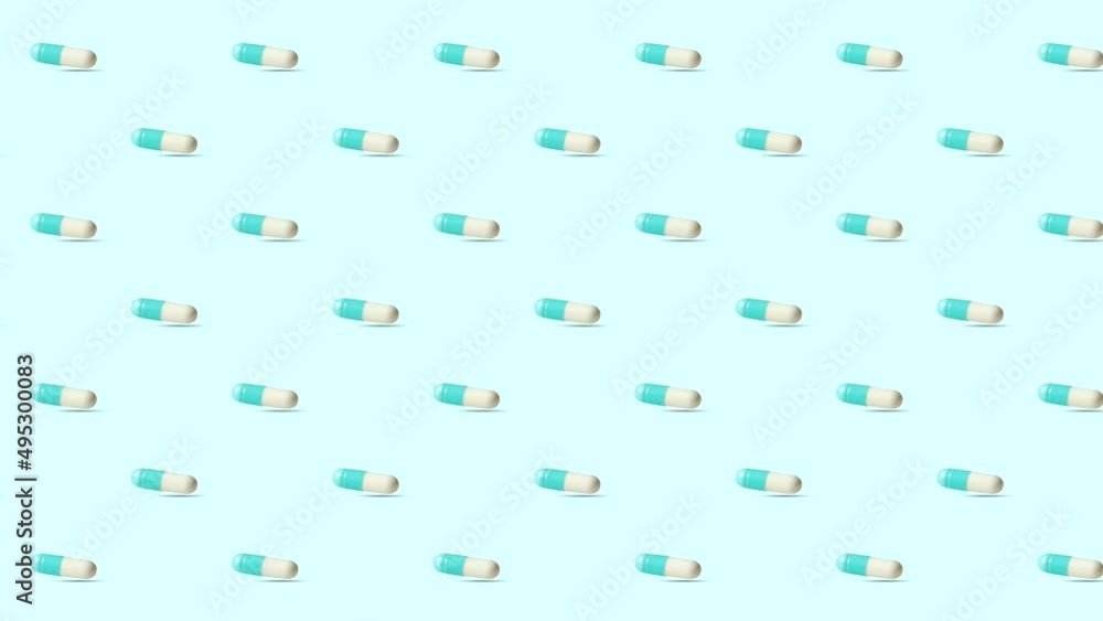 4k moves video. Creative layout made from capsules, pills. Medical, pharmaceutical background for web design, minimal pattern. Medical, pharmaceutical capsules on a blue background are slowly moving a 4k moves video. Creative layout made from capsules, pills. Medical, pharmaceutical background for web design, minimal pattern. Medical, pharmaceutical capsules on a blue background are slowly moving a