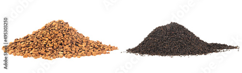 Pile of instant coffee granules and dry black tea leaves isolated on a white background. Sublimated coffee and Kenyan Black tea.