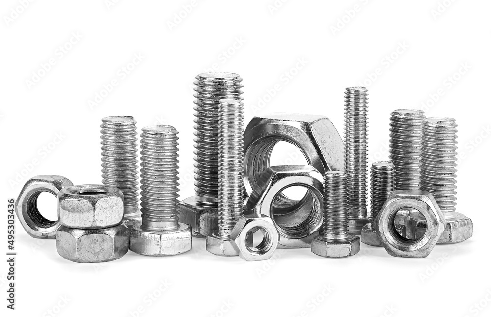 Large metal screws and nuts isolated on a white background. Industrial steel hardware bolts and nuts. - obrazy, fototapety, plakaty 