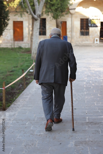 old person walking © MehmetAli