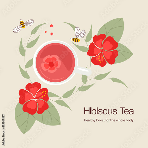 Mug of herbal tea among the hibiscus flowers.