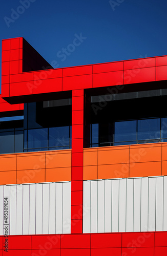  facade with colorful red panels © jozzeppe777