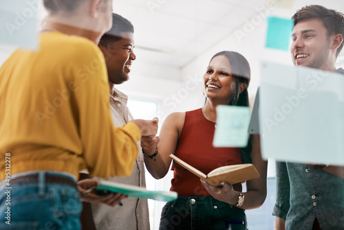 Our collaboration works because our skills complement each other. Shot of businesspeople shaking hands during a meeting in an office.