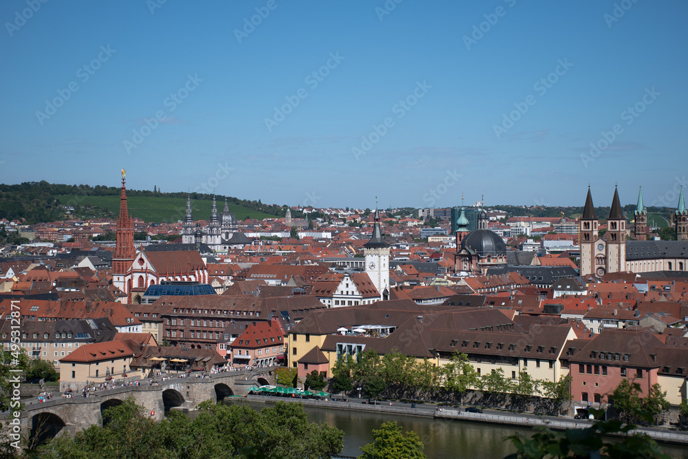 View of the old town of Würzburg in Bavaria, Germany, on a summer day, with the Main River in the foreground