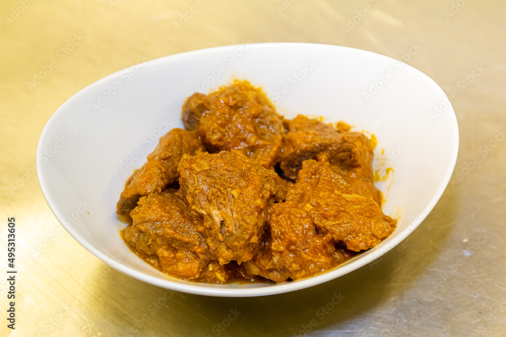Meat stew with red hot tomato sauce Meat stew with red hot tomato sauce