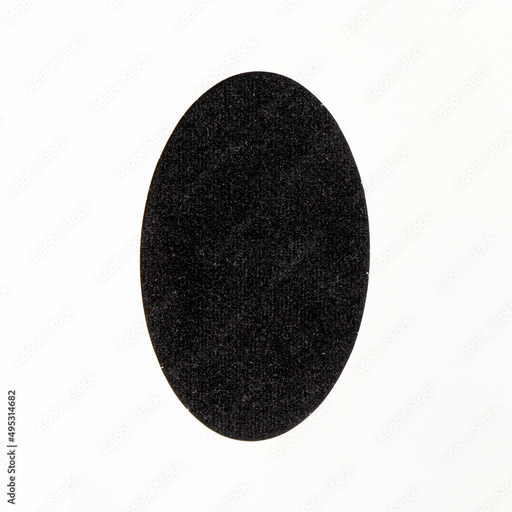 Black easter minimal concept. Optimistic flat lay arrangements made of awesome fluffy texture egg shaped with off white background. Black easter minimal concept. Optimistic flat lay arrangements made of awesome fluffy texture egg shaped with off white background.