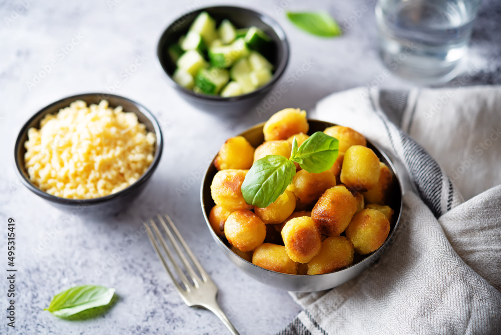 Fried potato gnocchi with cheese filling Fried potato gnocchi with cheese filling