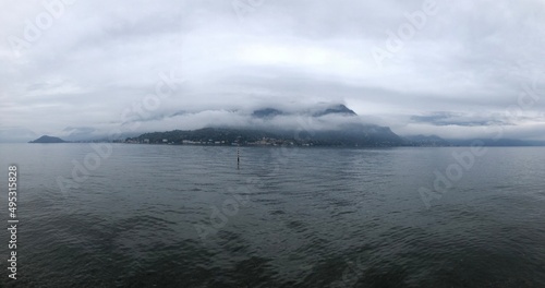 foggy mountains and water