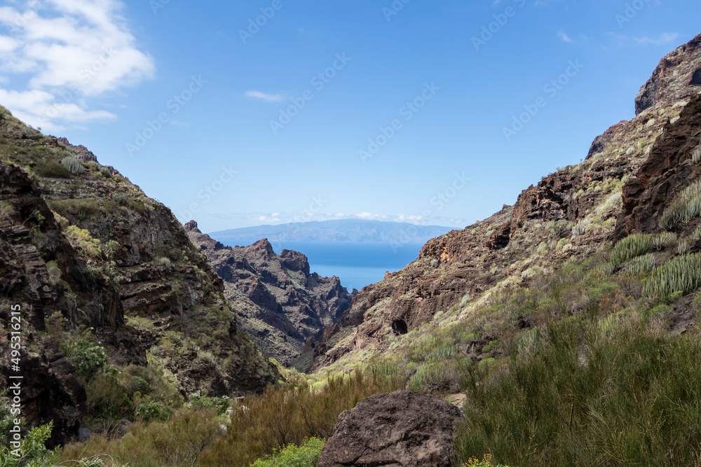 View on the Atlantic ocean and La Palma island from the Barranco Seco gorge, Tenerife, Canary islands, Spain
