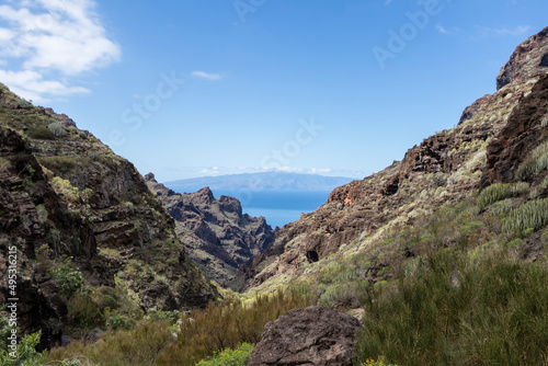 View on the Atlantic ocean and La Palma island from the Barranco Seco gorge, Tenerife, Canary islands, Spain © nomadkate