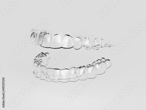 Clear invisible aligners upper and lower arches teeth straightening photo