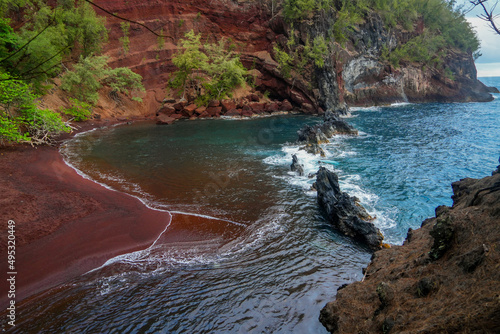 Canvas Print Kaihalulu Red Sand Beach on the Road to Hana in the East of Maui island in Hawai