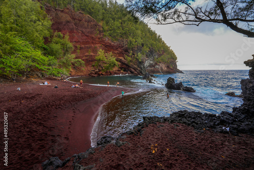 Kaihalulu Red Sand Beach on the Road to Hana in the East of Maui island in Hawaii, United States photo