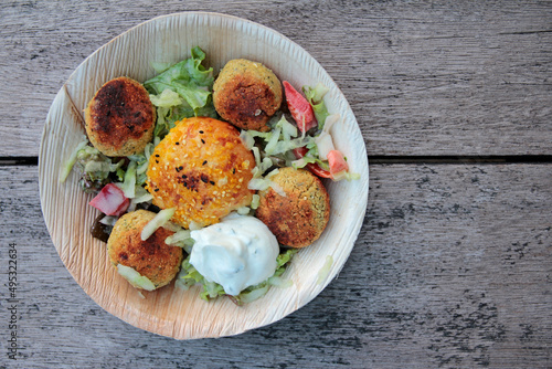 homemade falafel with bread and salad