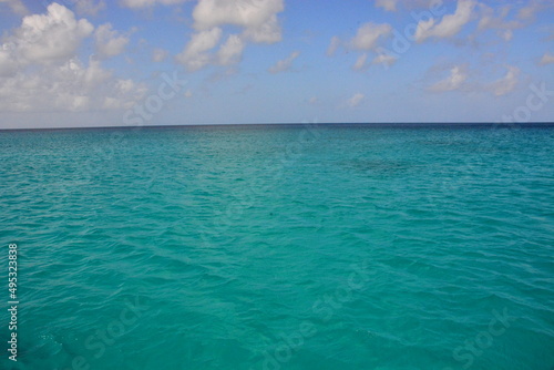 Green, turquoise water of the sea, ocean near Saona Island, Caribbean coast, Dominican Republic