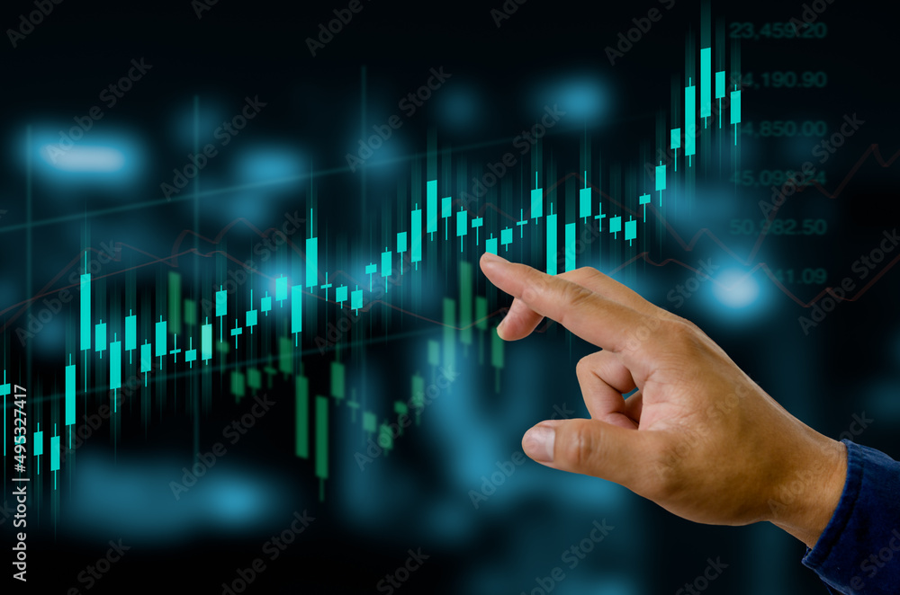 Finance and business investment concept. Stock and crypto investment funds.Businessman touching virtual screen data candlestick chart trading Forex graphs of financial. Finance and business investment concept. Stock and crypto investment funds.Businessman touching virtual screen data candlestick chart trading Forex graphs of financial.