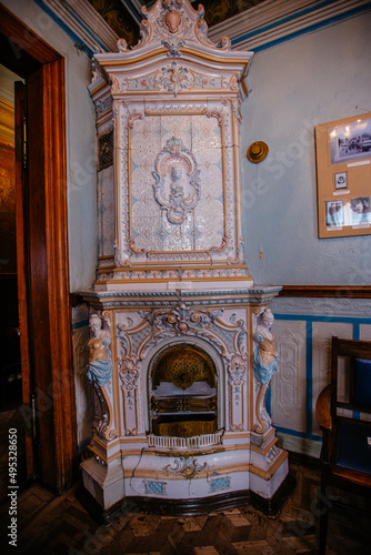 Old vintage ceramic fireplace at old mansion