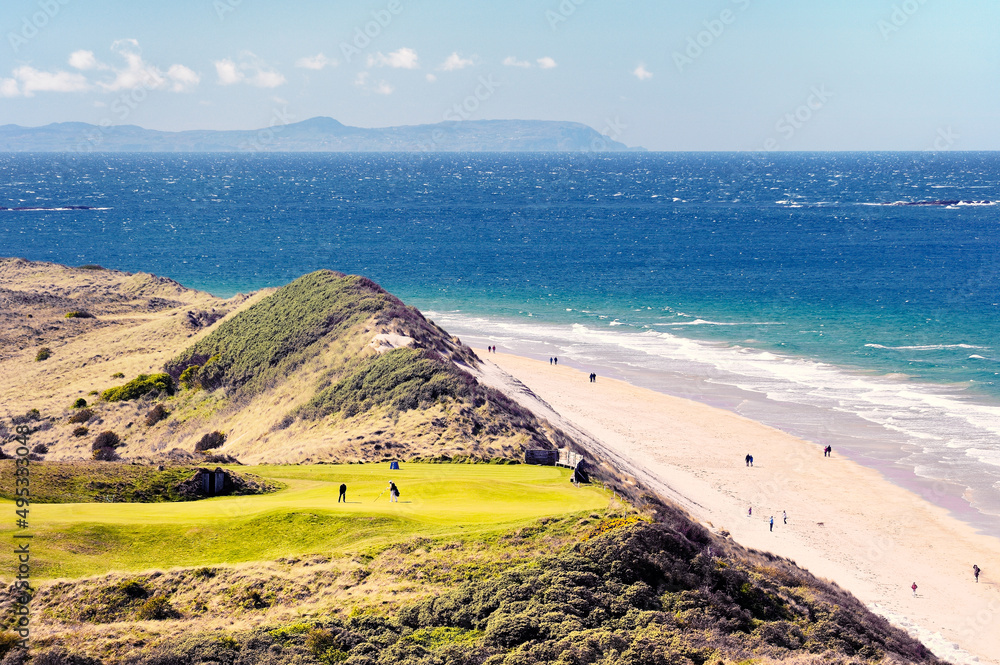 Royal Portrush Golf Club, Northern Ireland UK. The 5th hole of the Dunluce Links championship course above the White Rocks beach