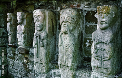 Celtic Christian monastic carvings of saints monks on White Island, Lower Lough Erne, near Enniskillen, Co. Fermanagh, Ireland. photo