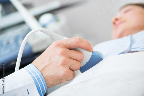 Doctor doing ultrasound screening checkup
