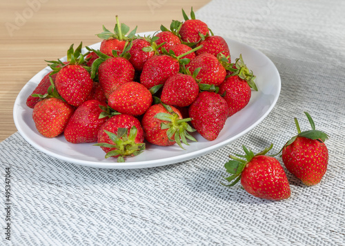 Sweet Strawberries on a White Plate