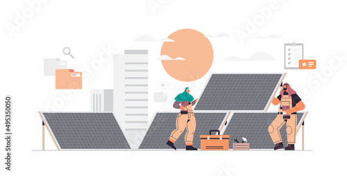 technician workers near solar panels station engineers checking alternative energy and using sunlight for producing electric