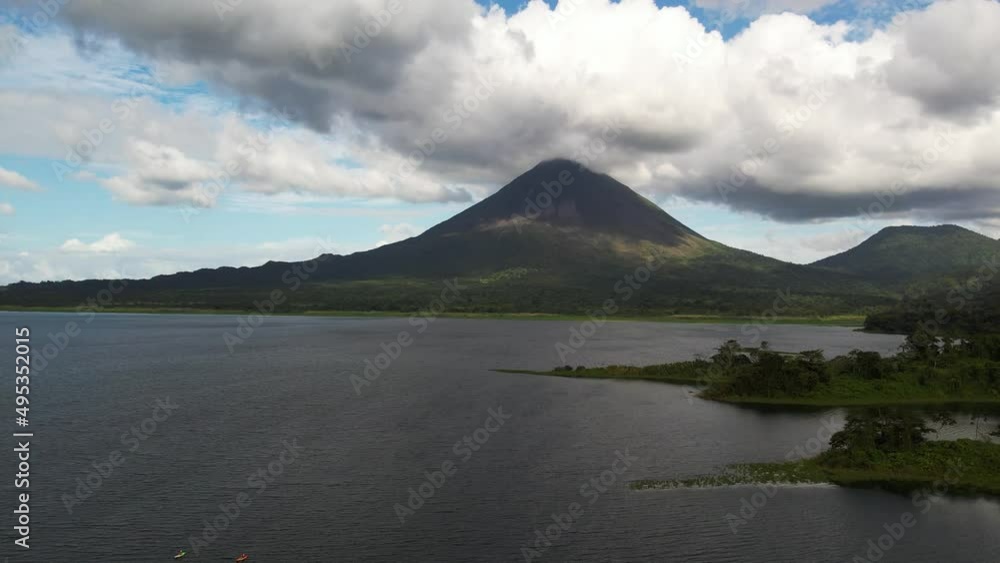 Drone flying forwards to iconic Arenal Volcano in Costa Rica. Aerial Drone flying forwards to iconic Arenal Volcano in Costa Rica. Aerial