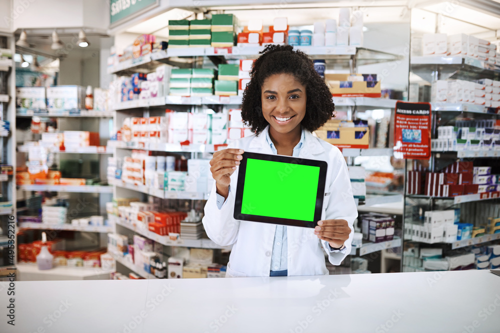 Getting a repeat on your prescription just got easier. Cropped portrait of an attractive young female pharmacist holding up a tablet with a chromakey screen. Getting a repeat on your prescription just got easier. Cropped portrait of an attractive young female pharmacist holding up a tablet with a chromakey screen.