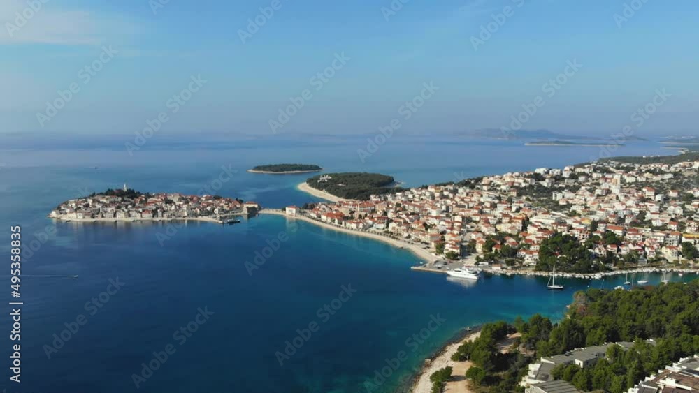 Aerial Primosten city pan to oldtown island. Aerial Primosten city pan to oldtown island.