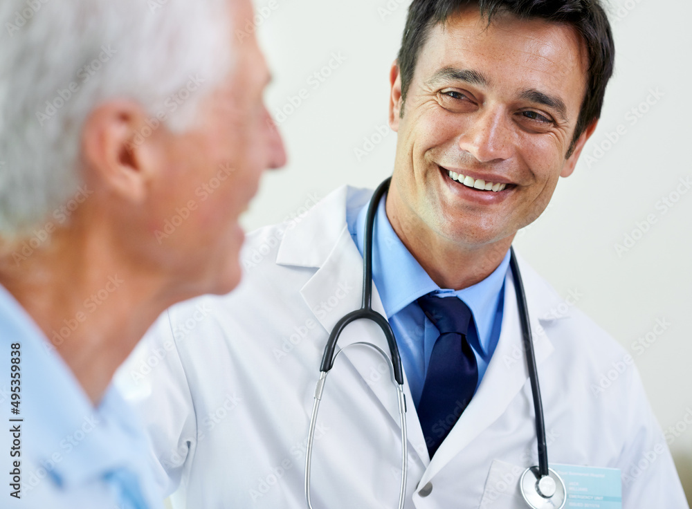 Its the best outcome. Shot of a handsome young doctor delivering news to a senior patient. Its the best outcome. Shot of a handsome young doctor delivering news to a senior patient.