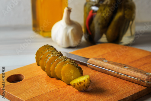 Pickled cucumbers in a jar.