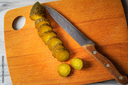 Pickled cucumbers in a jar.