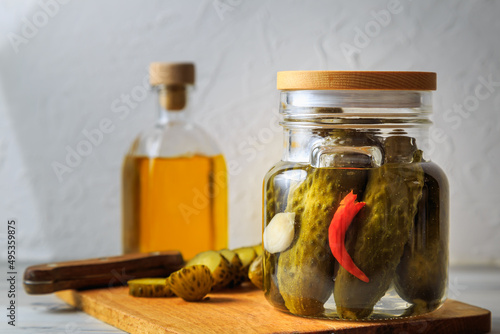 Pickled cucumbers in a jar.