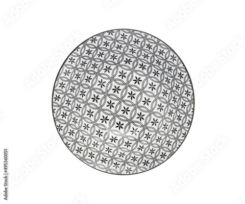 Plate on a white isolated background. View from above. Small flat round plate.