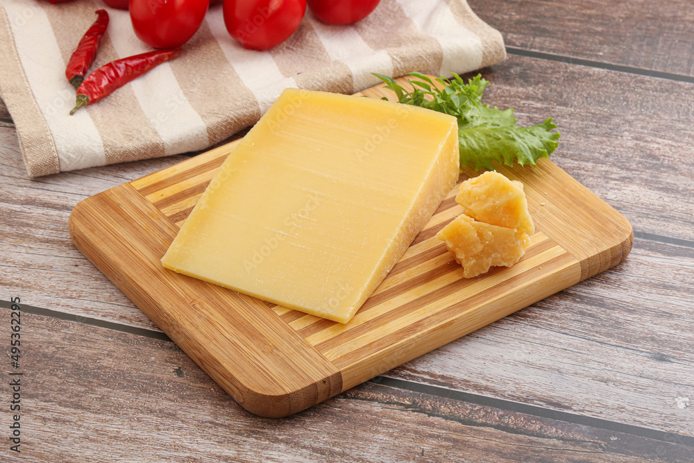 Parmesan hard cheese with small pieces Parmesan hard cheese with small pieces