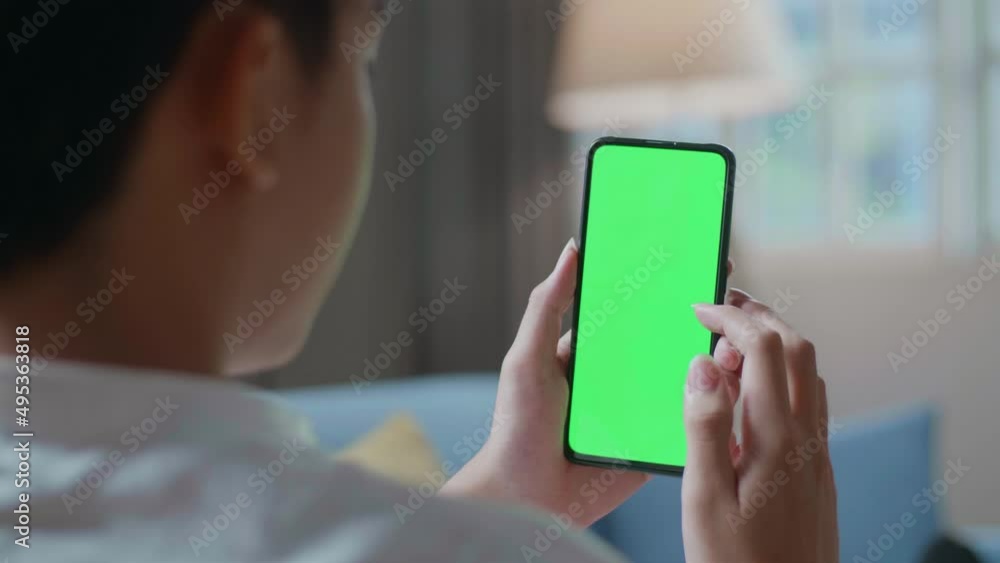 Close Up Of A Man Touching Smartphone With Green Screen In The Living Room
Close Up Of A Man Touching Smartphone With Green Screen In The Living Room