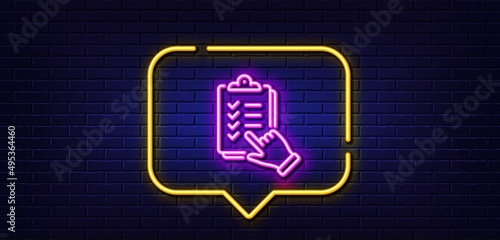 Neon light speech bubble. Checklist line icon. Clipboard document sign. Questioning survey symbol. Neon light background. Checklist glow line. Brick wall banner. Vector