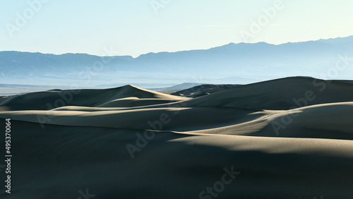 Sand dunes in the haze. Sand dunes at dawn.