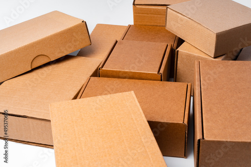 Lot of cardboard boxes on white background © fotofabrika